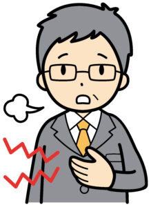 胸やけを感じる男性のイラスト